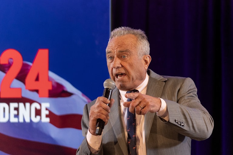 Robert F. Kennedy Jr. speaks into a microphone