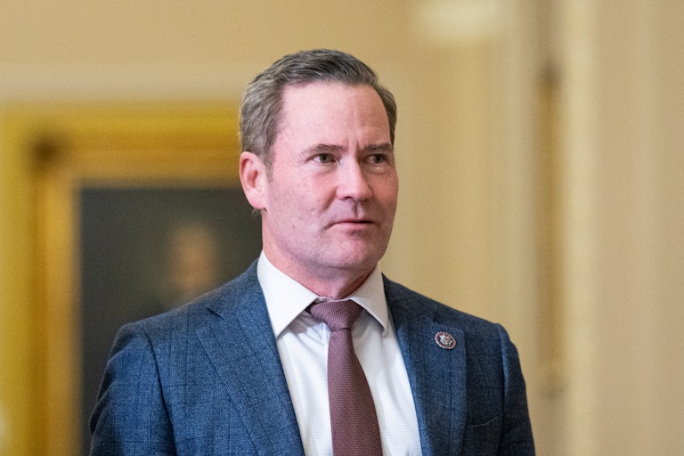Representative Mike Waltz walks in the Capitol