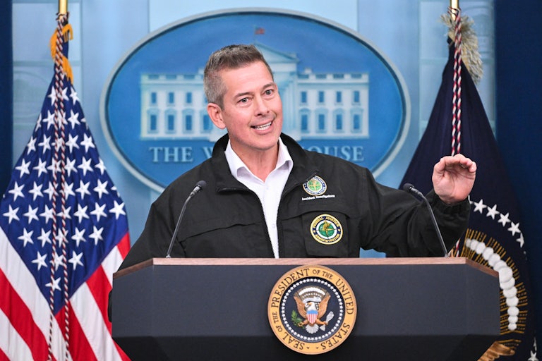 Transportation Secretary Sean Duffy gestures while speaking during a press conference at the White House