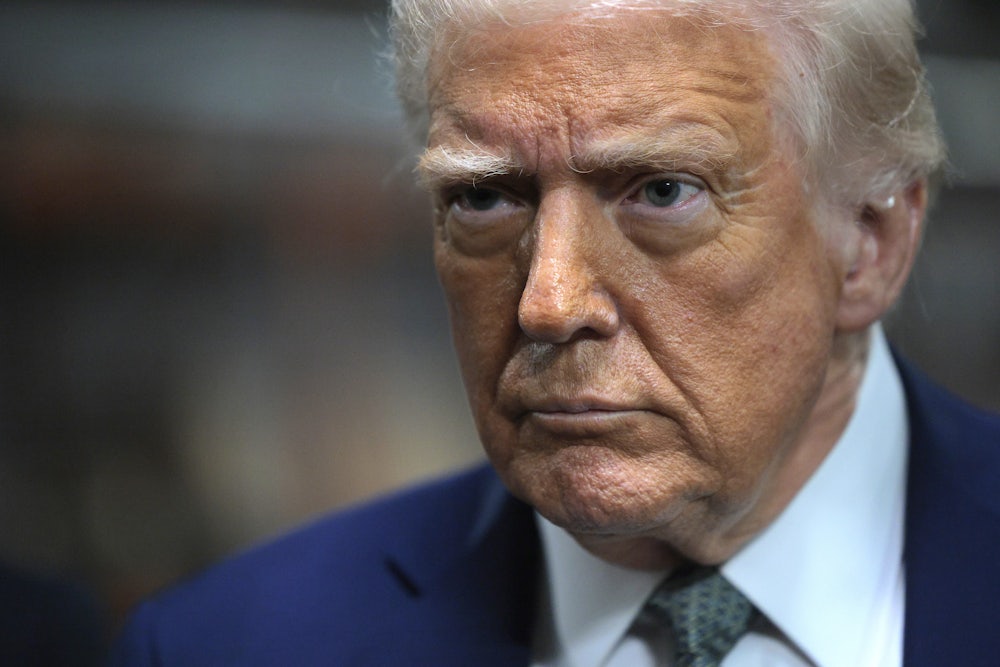 Donald Trump speaks to reporters