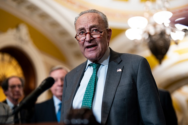 Senate Minority Leader Chuck Schumer talks to reporters in the Capitol.