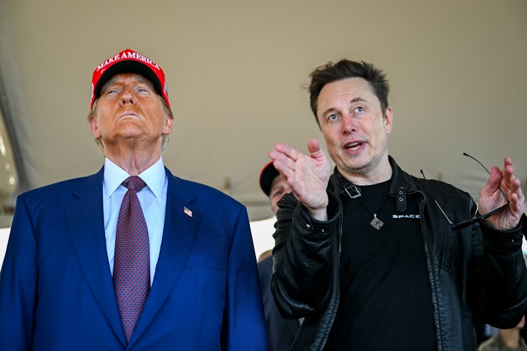 Trump and oligarch Elon Musk at a SpaceX event