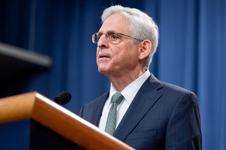 Merrick Garland stands at a podium