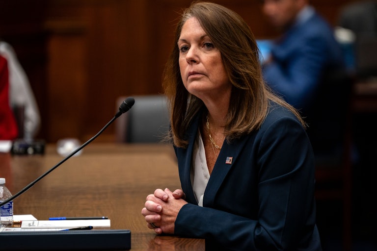 Secret Service Chief Kimberly Cheatle sits at a table during a House Oversight Committee hearing